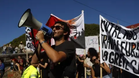 Countrywide Protests Begin In Response to Budget Cuts